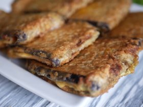 Баклажани з шинкою та сиром