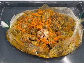 Плов у рукаві зі свининою