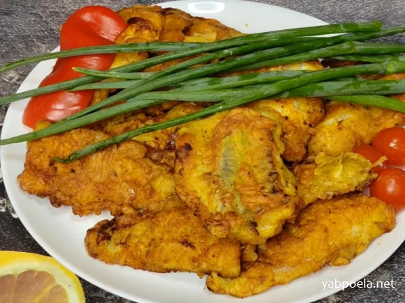 Минтай у клярі — ніжна риба із золотистою скоринкою